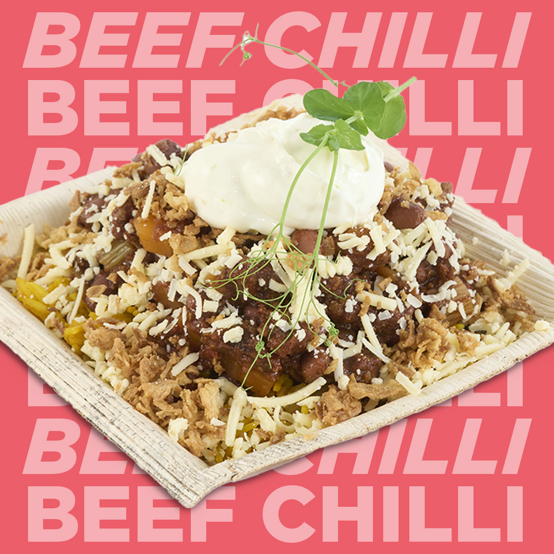 Venus Devon Beef Chilli with turmeric black bean basmati with cheese, crispy onion & lime mayo